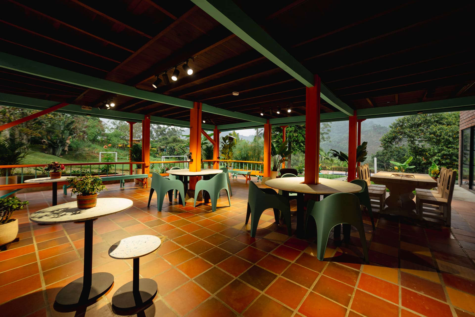 The illuminated main plaza of Jardín at night with warm lighting