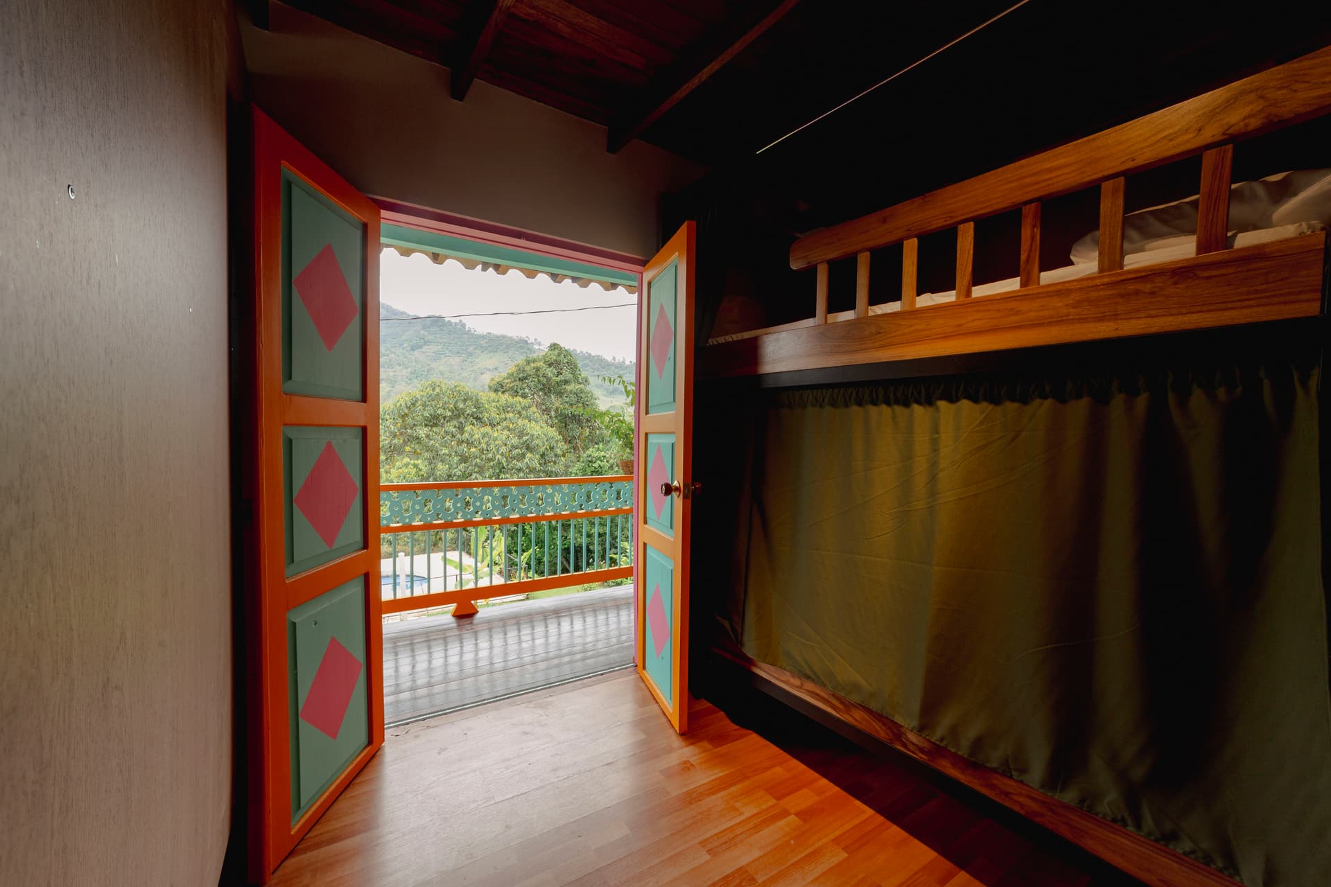 Traveler reading a book in a garden hammock surrounded by tropical plants in Jardín