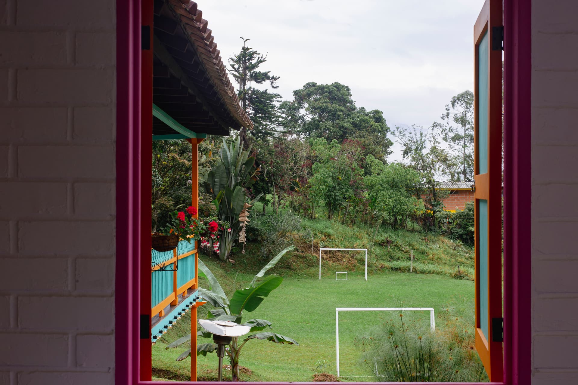 Group of hikers on a mountain trail above Jardín with sweeping valley views